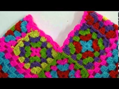 Crochet rainbow poncho