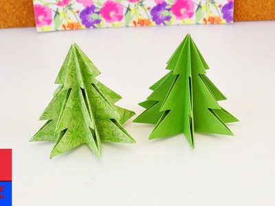 Sapin de Noël origami. Pliage pour les fêtes. Papier et ciseaux