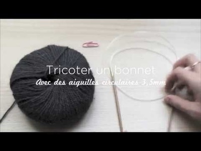 Bonnet au tricot avec des aiguilles circulaires