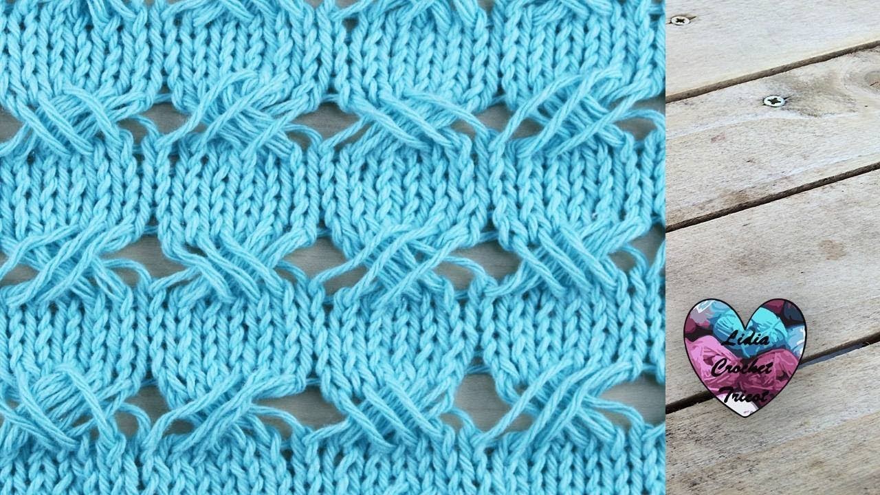 Point turquoise croisé tricot