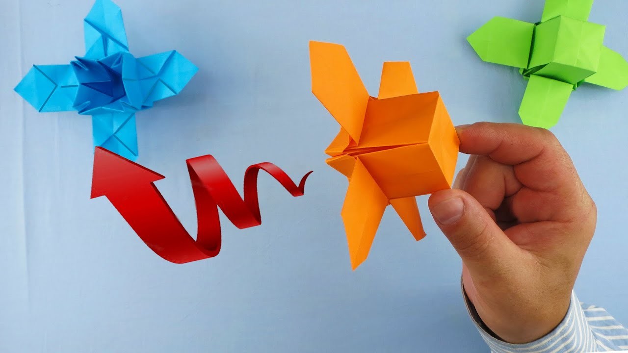 Куб оригами который летит.  cube origami qui tourne. Papierwürfel fliegt und dreht sich