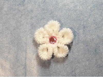 Comment faire une fleur avec une paille et de la laine